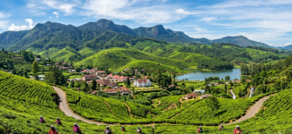 Panoramic view of Nuwara Eliya hill station surrounded by lush tea plantations and misty mountains in Sri Lanka