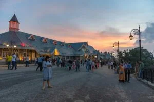 Hill Stations Crowds walking near colonial-style buildings on Shimla Mall Road at sunset