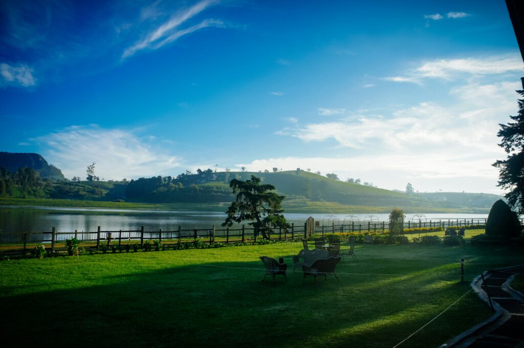 Misty green hills and scenic mountain road in Nuwara Eliya Sri Lanka hill country