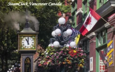 Place to visit in vacouer canada Gastown Steam Clock in Vancouver, Canada, surrounded by flowers and historic buildings