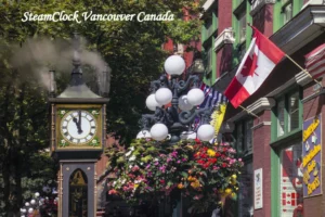 Place to visit in vacouer canada Gastown Steam Clock in Vancouver, Canada, surrounded by flowers and historic buildings