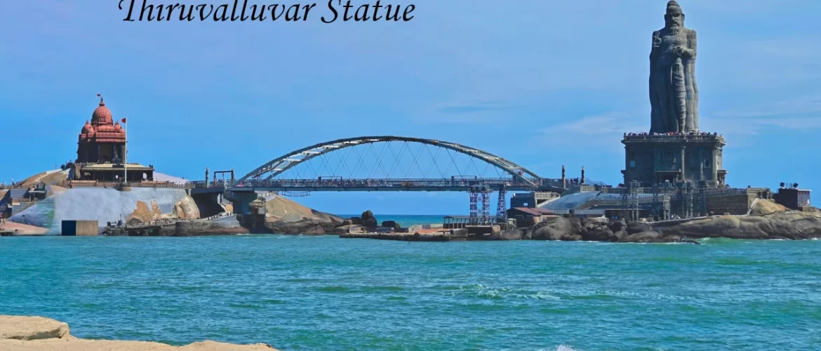 The towering Thiruvalluvar Statue and Vivekananda Rock Memorial connected by a pedestrian bridge, a signature landmark of Kanyakumari Tourism.
