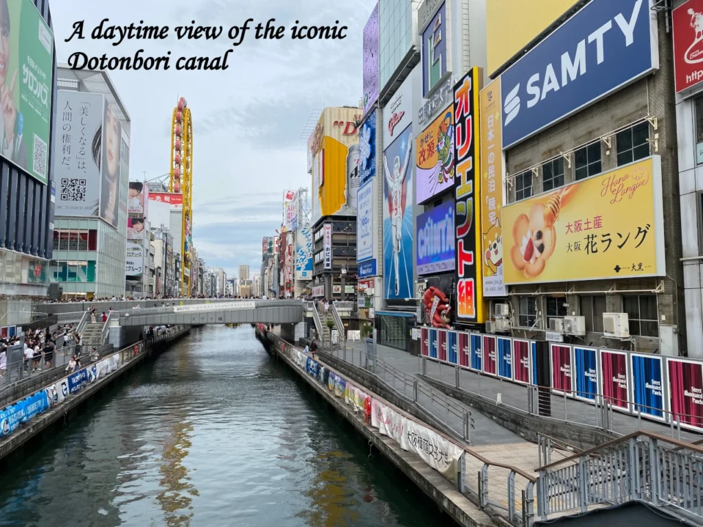 The vibrant Dotonbori canal in Osaka, featuring massive neon billboards and the famous Glico Man sign, highlighted in a Tokyo vs Osaka travel comparison