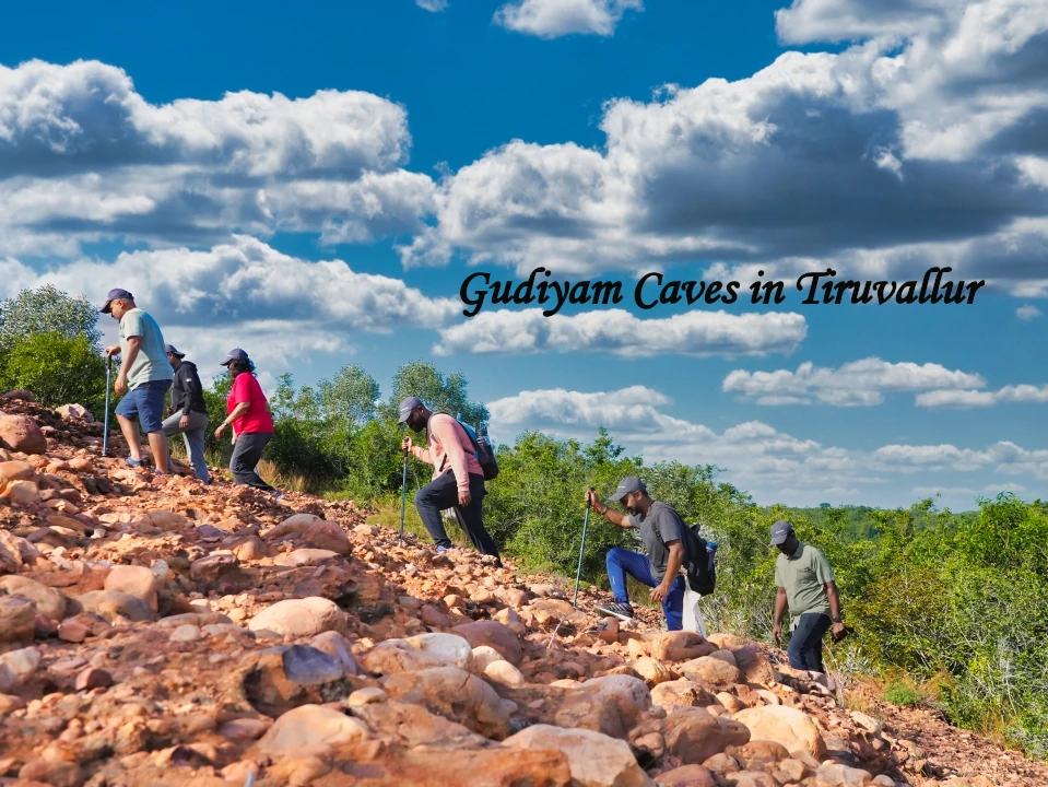 Trekkers exploring the rocky trail at Gudiyam Caves in Tiruvallur