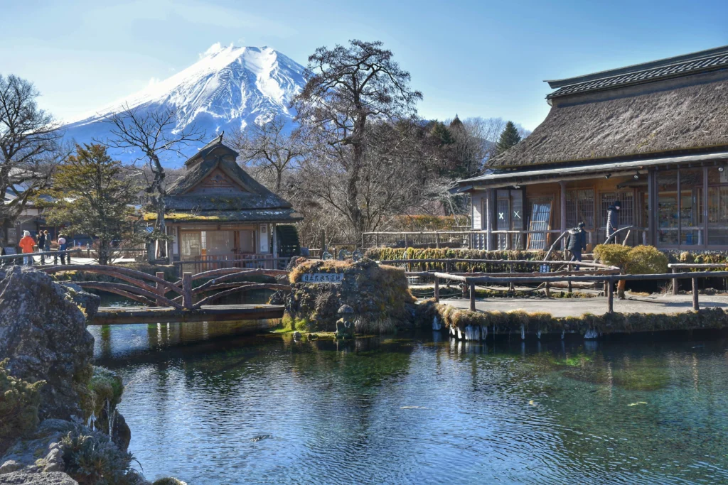 Oshino Hakkai spring-fed ponds with traditional village houses and Mount Fuji
