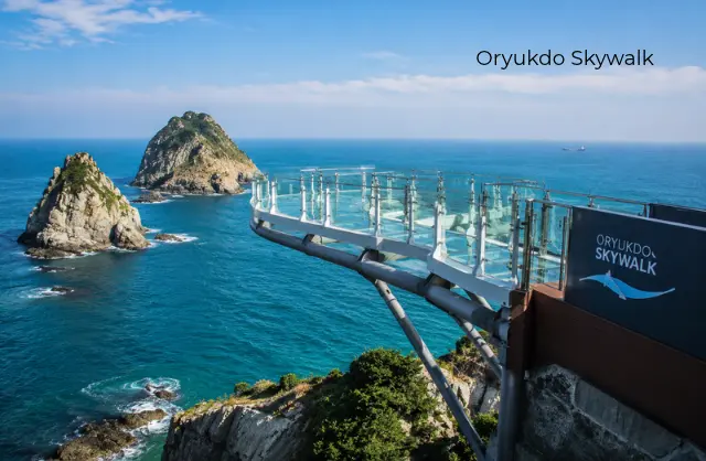 Oryukdo Skywalk glass bridge with panoramic sea views and rocky islands in Busan, South Korea.
