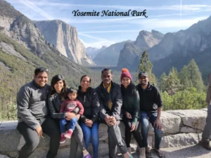 Yosemite National Park valley with granite cliffs and forest Description: Featured image for the San Jose to Yosemite National Park 2026 road trip guide, showing the park's iconic valley scenery.