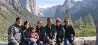 Yosemite National Park valley with granite cliffs and forest Description: Featured image for the San Jose to Yosemite National Park 2026 road trip guide, showing the park's iconic valley scenery.