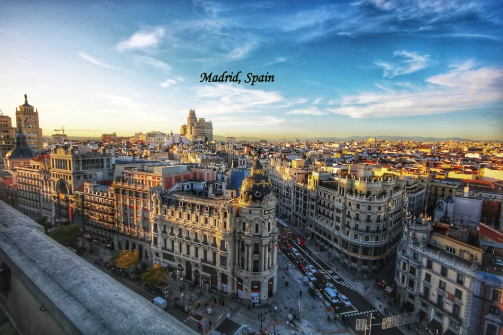 Spain tourism Madrid, Spain cityscape with historic buildings and Gran Vía architecture