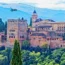 Spain Tourism Alhambra palace and historic architecture surrounded by green hills