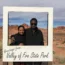Couple posing in front of red sandstone formations at Valley of Fire State Park in Nevada