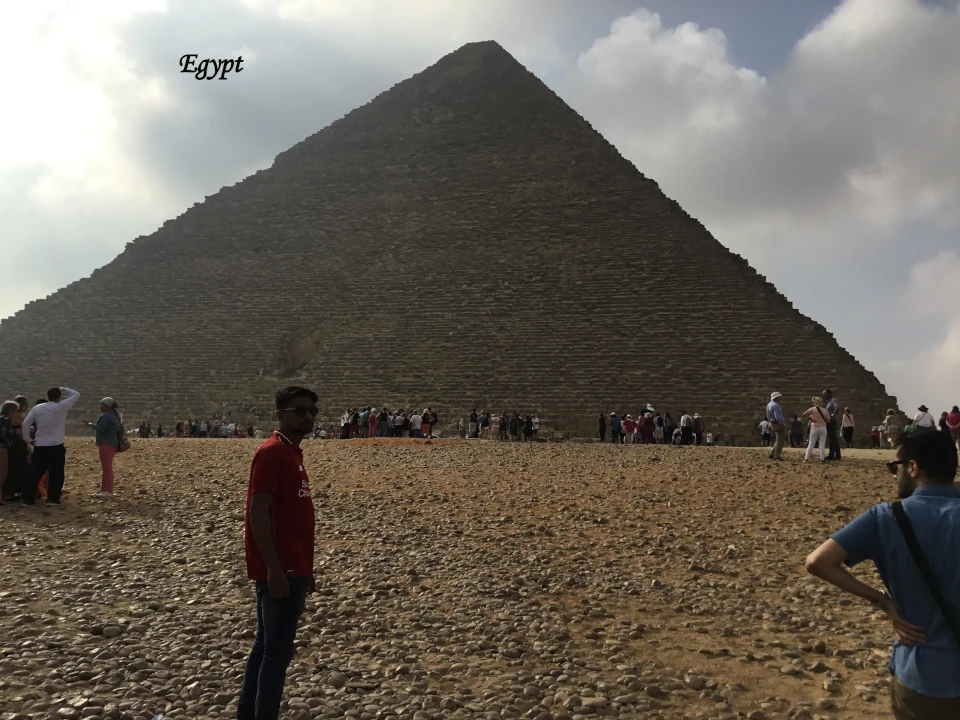 Egypt tourism, Great Pyramid of Giza in Egypt with tourists exploring the historic landmark